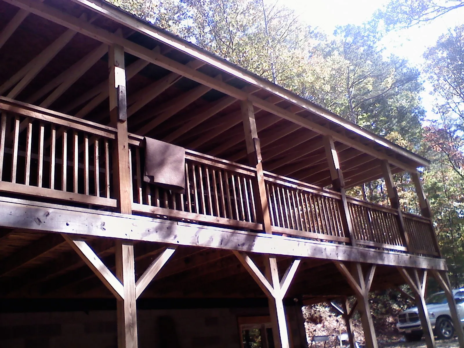 Timber framing under a new elevated porch and deck — Roof Leak Repair in North Arlington by Roofing Brothers